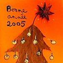 Avec un feutre doré contourne la feuille et ajoute une inscription en lettres d'or : Bonne Année, Meilleurs Voeux...