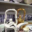 Verseuses et mugs,
Kühn Keramik