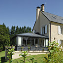 Bien conçue, une véranda offre un agréable espace à vivre baigné de lumière. Technal.