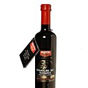 Particulièrement goûteux, le vinaigre de tomates sur de la roquette ou des tomates fraîches