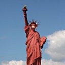 Illustration la Vache Qui Rit qui détourne la statue de la liberté