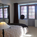 La chambre Nature dispose d'un balcon où il fait bon prendre le soleil