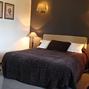 Des choix de matériaux et de tissus de qualité : boutis Blanc d'Ivoire, rideaux Nobilis...