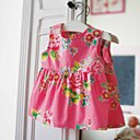 Une petite robe rose en tissu japonais.