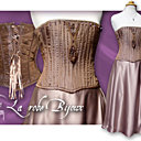 La robe bijoux - corset en taffetas avec perles posées à la main sur jupe de soie souple.