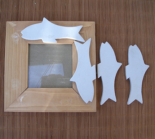 Coller les poissons sur le cadre