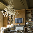 Bois naturel, lustre vénitien, canapés profonds, une sensation de bien être