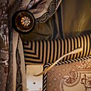 Une profusion de belles étoffes Pierre Frey rehaussées par de somptueuses passementeries