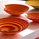 Des touches de couleur attirent le regard, sans effacer cette impression de légèreté et de sérénité