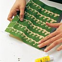 Coller le papier sur le cahier