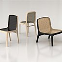 Tendues à la façon d'un tamis, les assises de la chaise ou la chauffeuse Yumé sont faite de cannage ou de batyline