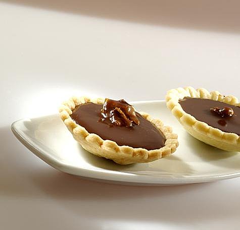 Tartelettes noix chocolat accompagnées de Pineau