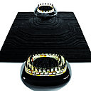 L’un des galets un bois laqué conserve les notes au frais, l’autre humidifie l’air