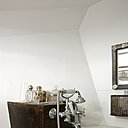 Des tuyaux habilement camouflés par un coffrage en métal rouillé, Evasion 55.