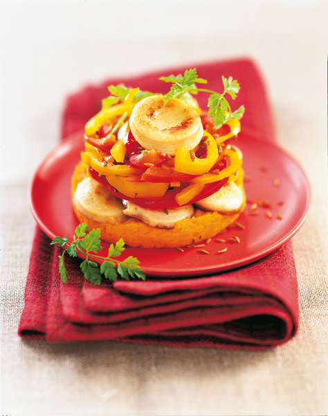 Une timbale raffinée de boudin blanc et de légumes colorés