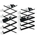 Une bibliothèque modulable. Sa structure métallique en forme de pantographe permet le libre positionnement au mur en fonction des besoins. Finition zinguée ou laquée mate blanc ou noir. L 97 à 100 x P 25,5  x H 155 à 230 cm. 1282 €. Design Denis Santachiara. Edition Desalto. Bibliothèque Booxx. Meubles et Fonction.