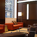 Hall d’entrée siège social Paris. L’espace d’attente du hall d’entrée du siège social d’une compagnie d’assurances situé près des Champs Elysées. Lambris en wengé réalisé avec des réservations lumineuses, mobilier en cuir et inox. Hall d’entrée siège social Paris. L’espace d’attente du hall d’entrée du siège social d’une compagnie d’assurances situé près des Champs Elysées. Lambris en wengé réalisé avec des réservations lumineuses, mobilier en cuir et inox.