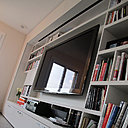 Bibliothèques, rangements et meubles hifi ont été entièrement dessinés en vue d'une parfaite intégration