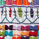 Détail d'un somptueux chauffe épaule © Tricotcolor