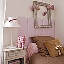 La chambre d’enfants aux accents rose et chocolat.