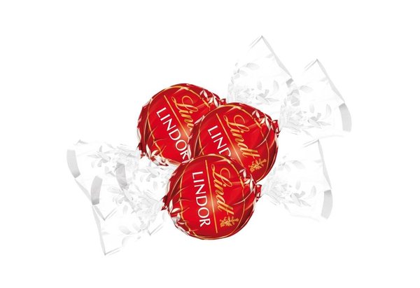 Pur moment de bonheur en dégustant 3 papillotes au chocolat au lait Lindor