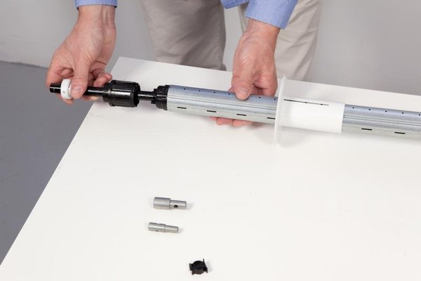 12-Inserez l'embout télescopique