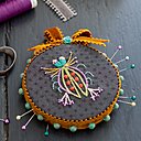 Insecte enrubanné pour pique épingles