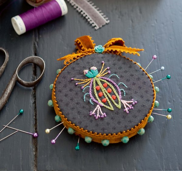 Insecte enrubanné pour pique épingles