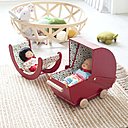 Un adorable berceau en Skivertex pour promener son bébé et un rocking chair pour le bercer