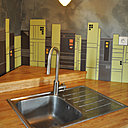 Fresque contemporaine alliant la qualité des matériaux, le design et le côté fonctionnel d' une cuisine résolument moderne