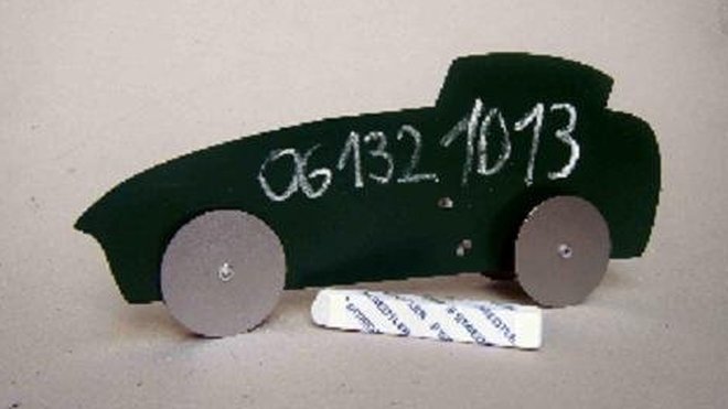 "Ambassador" voiture recouverte de peinture à tableau noir, permettant d''écrire avec une craie.