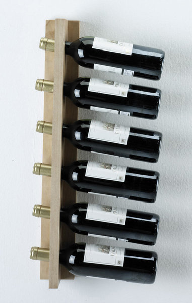 Pour ranger quotidiennement les bouteilles. En pin brut. 61 x 8 cm. 7,50 €. Astigarraga. Leroy Merlin. www.leroymerlin.fr