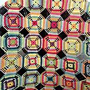 De simples carrés crochetés mis bout à bout et un splendide assemblage de couleurs forment ce Kaléidoscope de Cécile Balladino crée pour Marie Claire Idées