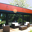 La terrasse sous la pergola