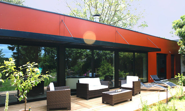 La terrasse sous la pergola