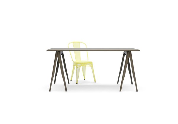 Les tréteaux Tolix kaki, designés par Normal Studio, en métal peint brut et vernis mat, donnent une allure industriel à un bureau ou à une salle à manger.