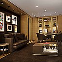 Esprit bureau masculin avec lambris et canapés de cuir pour la boutique Cartier St Honoré à Paris.