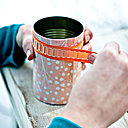 5- Enroulement et recouvrement du ruban autour du papier.