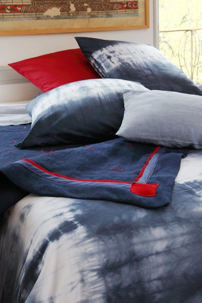 Coussins, oreillers, plaid et couettes se jouent des couleurs.