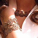 Collier Eda sable doré en fil rehaussé de perles et son bracelet double.