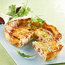 Plat fétiche des petits et grands, la quiche lorraine garde tout son moelleux avec du lait en poudre.