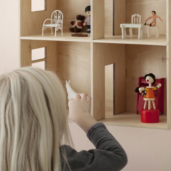 On peut choisir de laisser la maison en bois brute.