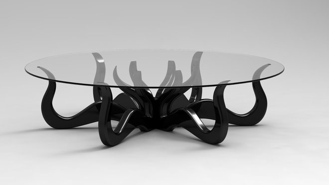 Les tentacules de la pieuvre se déploient pour servir de piètement stylisé avec le designer Jesse Shaw. La table « Octopus » permet de mettre en valeur l’agilité du mouvement dans une structure en bois, soutenant une plaque de verre.