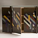 Alliant la tradition de la marqueterie à la modernité de motifs inspirés par Sonia Delaunay, le studio Patternity réalise une série de meuble qui met à l’honneur le bois, dans une déclinaison de couleurs à la parfaite abstraction.