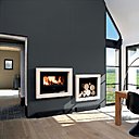 Un style indémodable pour cette cheminée en pierre qui est disponible en 8 coloris de pierre. Rendement 80 %.  80 x 70 cm. Cheminée Illiade. Cheminées Richard Le Droff.