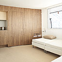 Les cloisons sont aussi utilisées en mur de rangement.