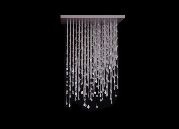 Perle de pluie, un lustre divin en soie, silicone cristal et Leds qui est issu d’un procédé exclusif de dentelle en silicone, inventé par la créatrice Tzuri Gueta. Telle une cascade translucide, des gouttes de lumière s’animent dans un halo bleuté. Création Tzuri Gueta et  Tony Jouanneau, 2008.