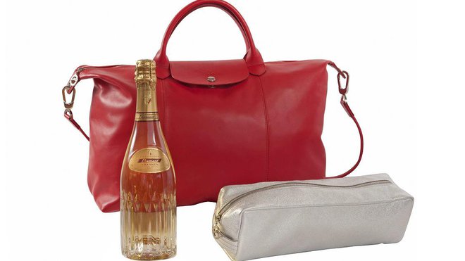 Sac Longchamp en cuir rouge pour accueillir le champagne cuvée est le Diamant Brut, Vranken.