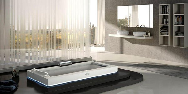 Design pur, sobre et net et très pour la baignoire à remous « Aura » en Corian, dessinée par Carlo Urbinati pour  Jacuzzi.