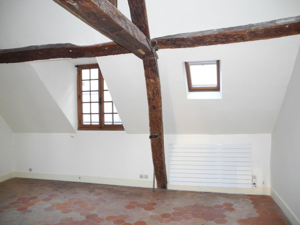 Une charpente omniprésente qui a été conservée.